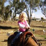 Paige & Kaylin riding Kisses with Grandma Carla