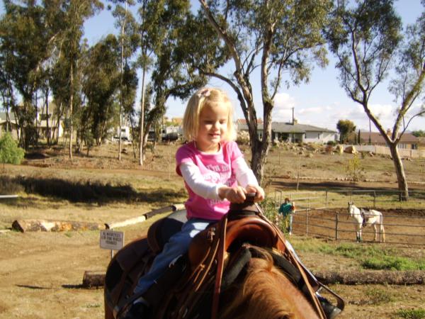 Paige & Kaylin riding Kisses with Grandma Carla