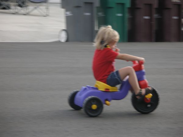 Riding around while on her phone