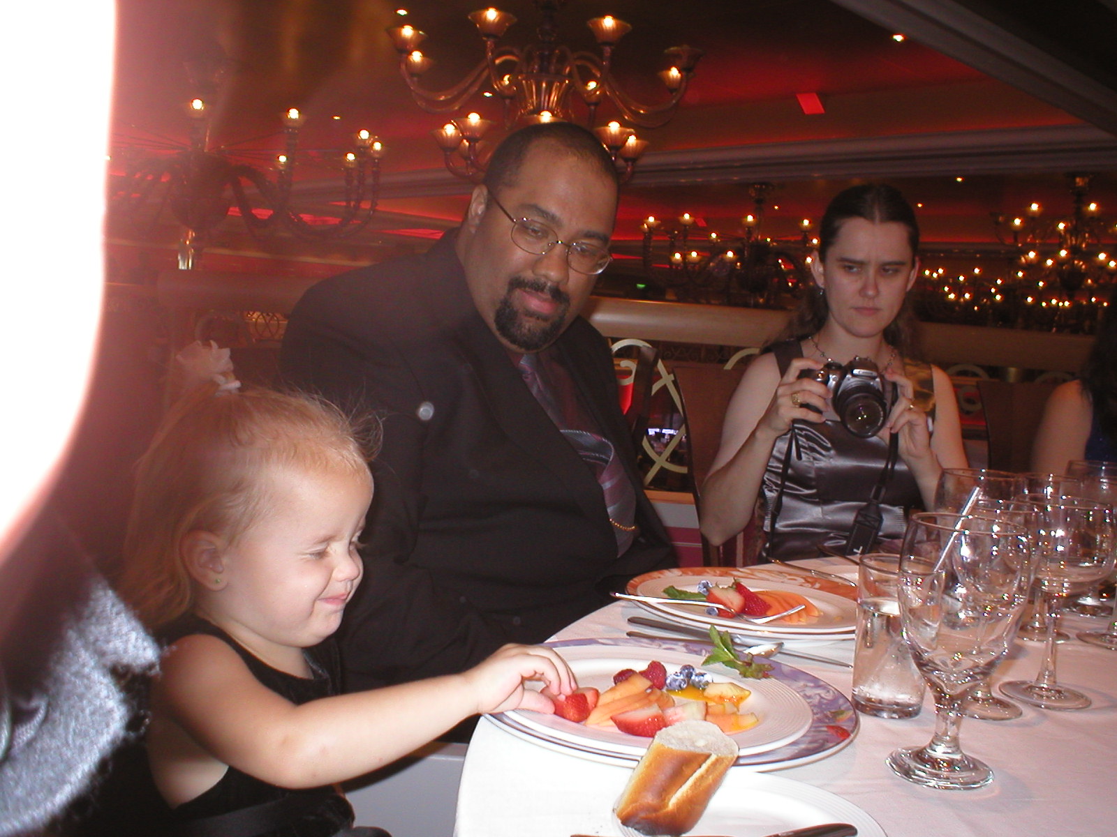 Kaylin stuffing her face at formal night... with onlookers.