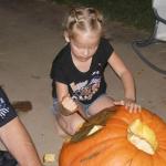 Kaylin - carving her huge pumpkin