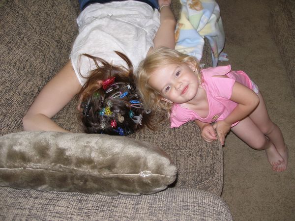 So proud of herself...she used every hair clip in the box.  That's what happens when you fall asleep on the couch