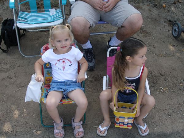 Kaylin & Paige Watching the 4th of July Parade, AKA the Candy Parade