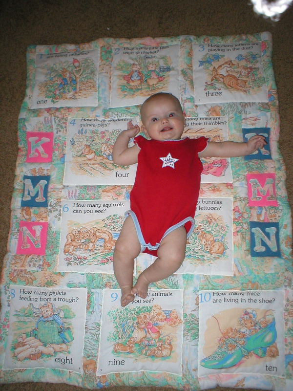 Kaylin on her quilt.
