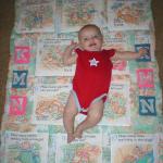Kaylin on her quilt.