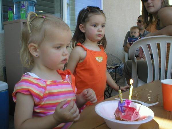 Blowing out candles.