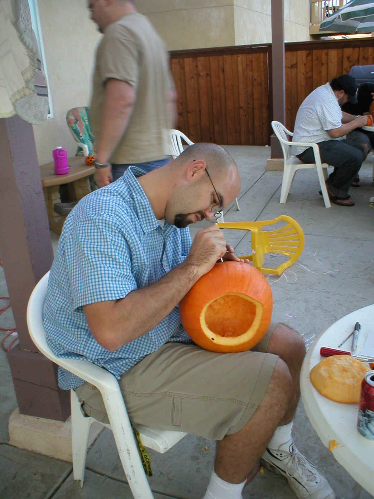Ryan carving his pumpkin