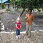 Belize - Altun Ha Mayan Ruins - Kaylin & a local kid with a parrot