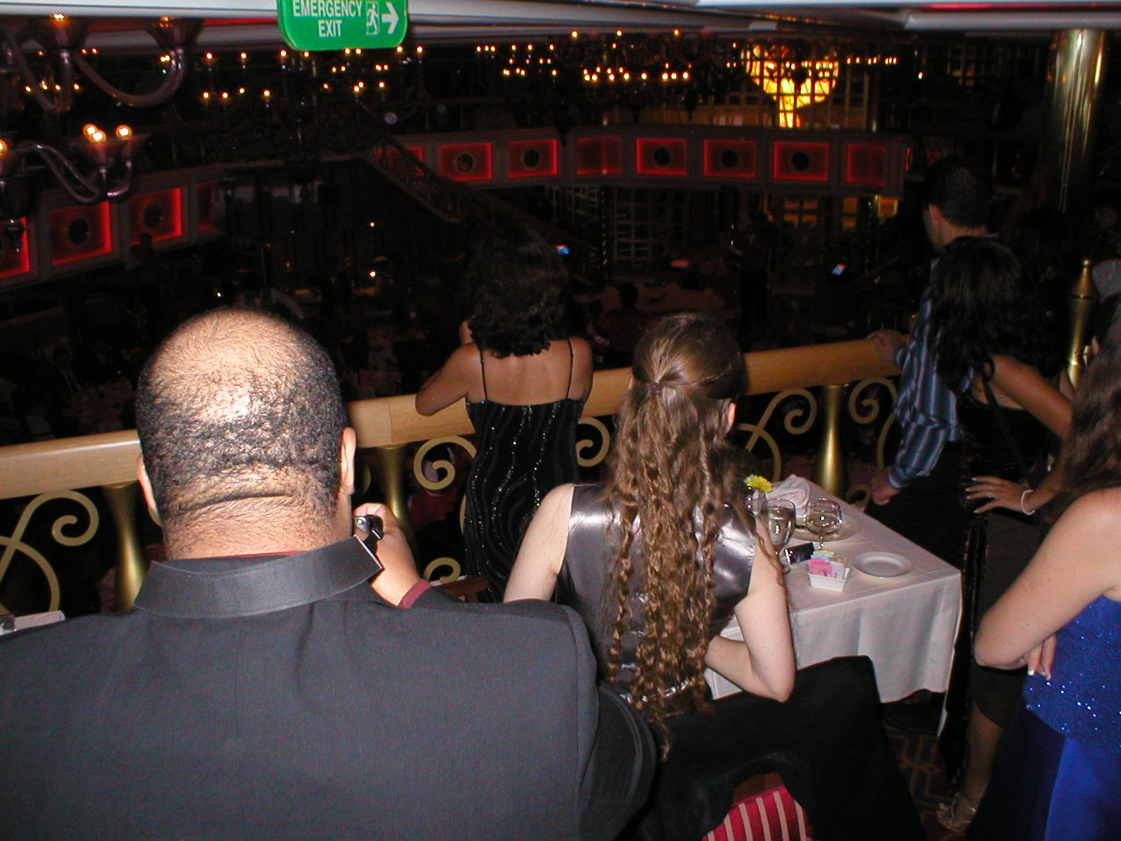 Maybe Christine should share some hair?  Really they're watching the waiters dance.